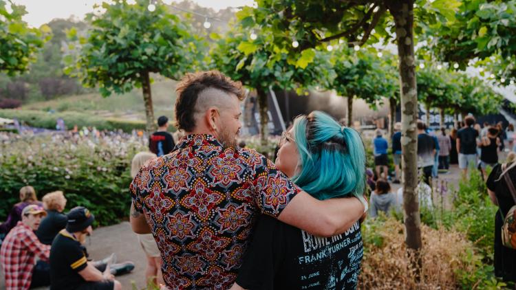 Couple enjoying Eden Session hugging